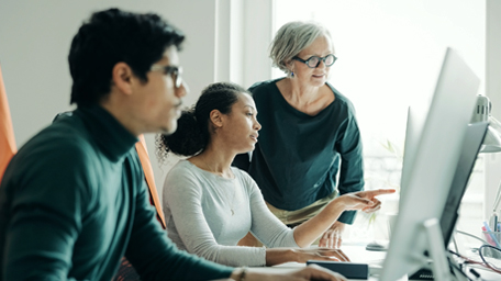 Business people working together in an engineering office
